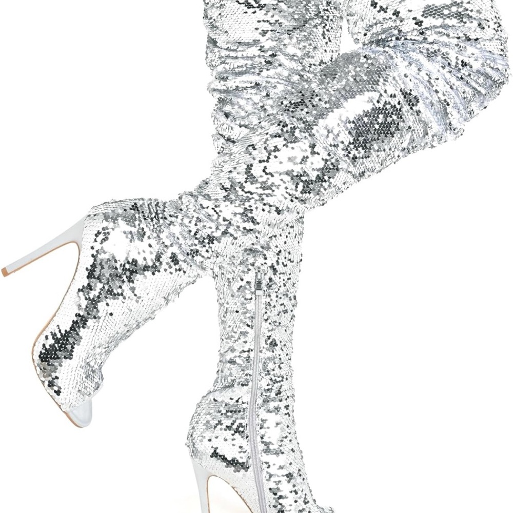 Glamorous Silver Heeled Boots with Dazzling Finish